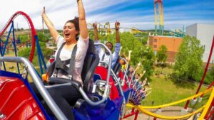 Close up of a the beginning of a group of people on a roller coaster at Six Flags Fiesta Texas in San Antonio, Texas